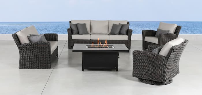 Create an outdoor living room experience with a wicker patio set