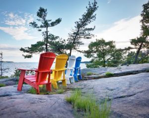 rainbow coloured muskoka and adirondack chairs