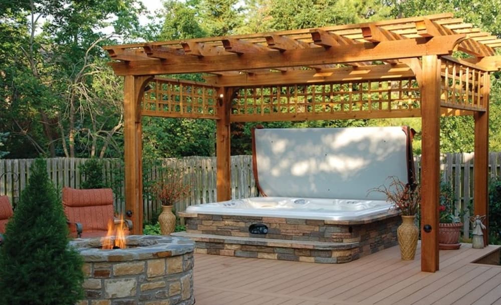 hot tub with pergola covering it is one of the many ideas for a hot tub on a deck